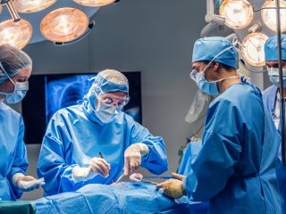 Surgeon team operating.
